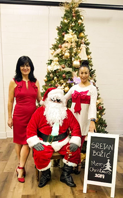 Santa Claus with two ladies